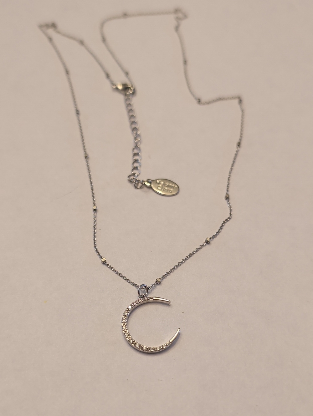 Melania Clara Silver Tone Crescent Moon Pendant Necklace